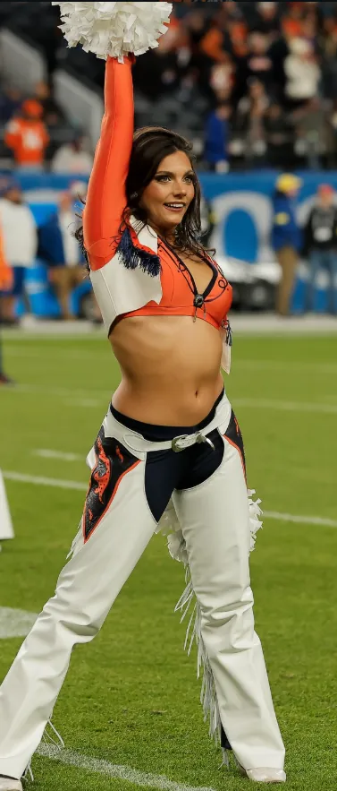 Chloe performing on the football field