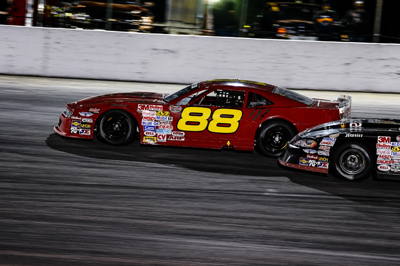 David Rothrock racing the red number 88 Camaro