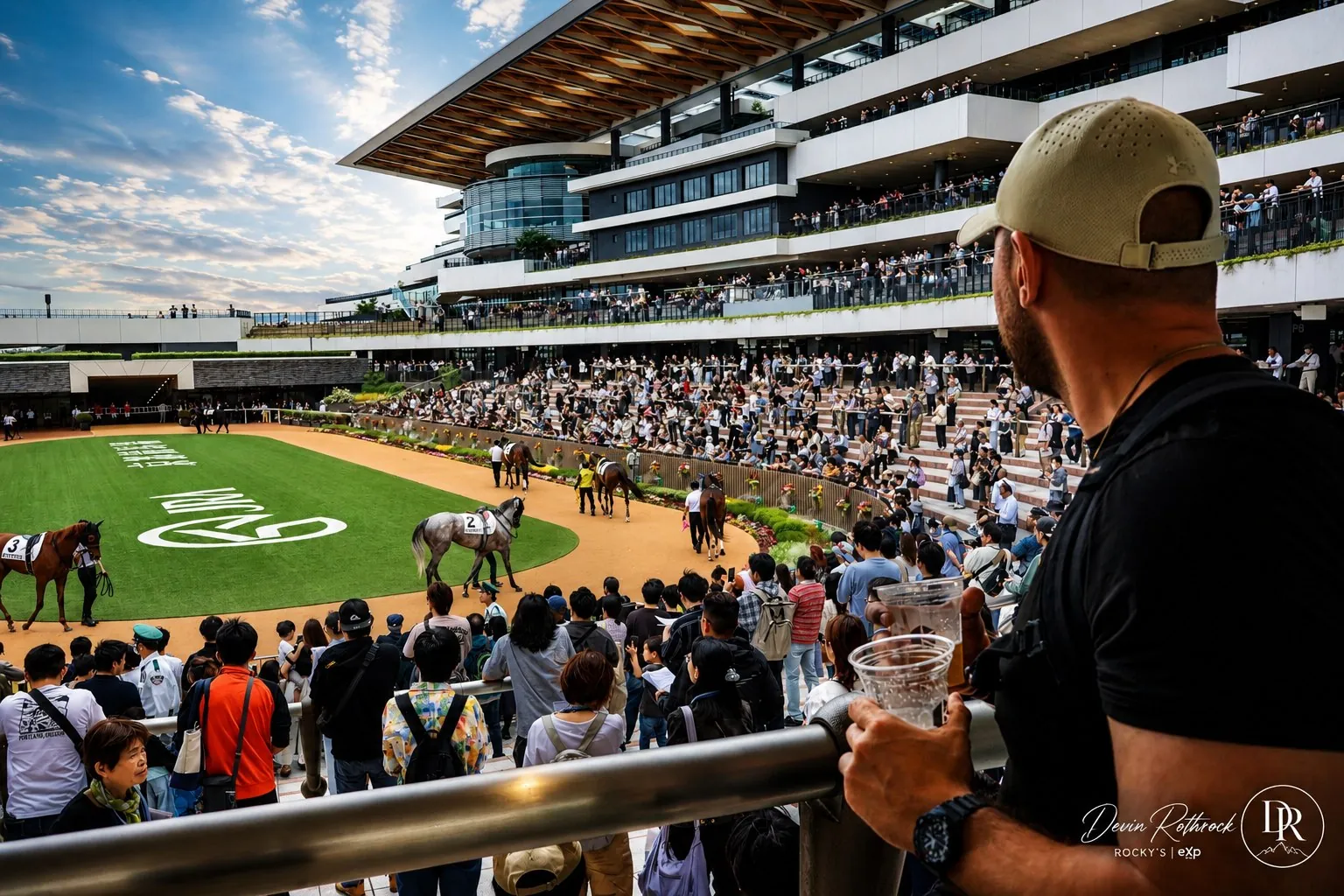 Devin Rothrock overlooking a grand racetrack paddock