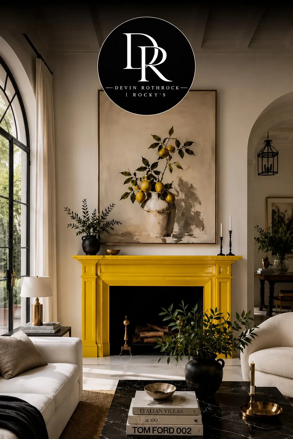 A refined living room with a bold yellow fireplace and curated art