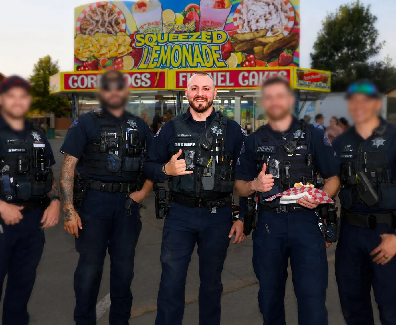 Adams County Sheriff deputies, including Devin Rothrock, on duty at the county fair